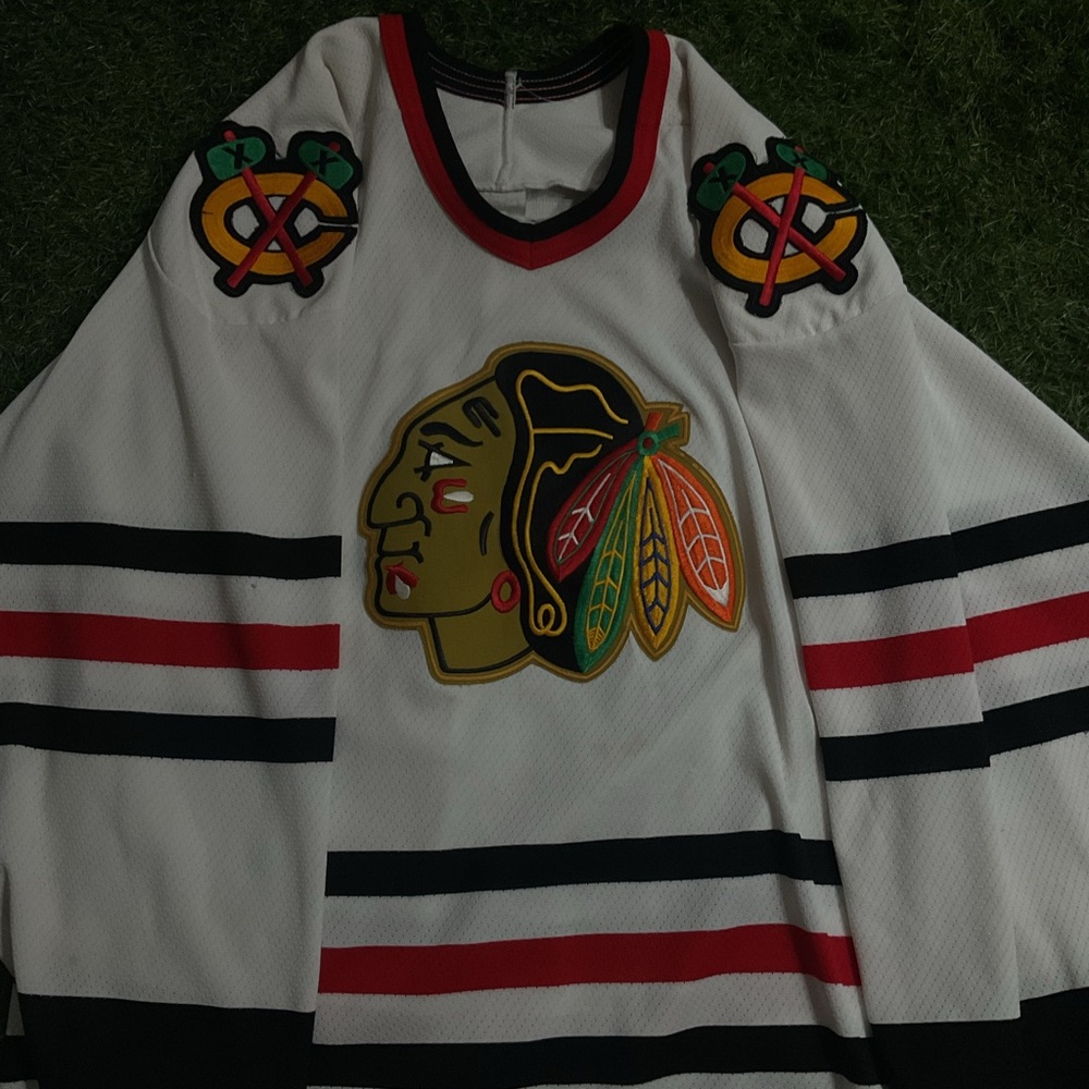 CCM White Jersey with Black and Red Stripes